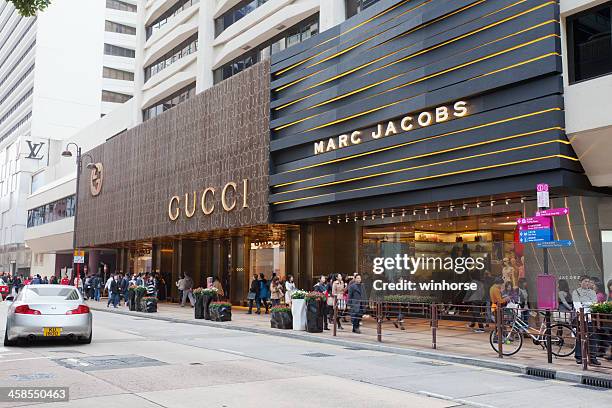 canton road in tsim sha tsui, hong kong - gucci flagship stock pictures, royalty-free photos & images