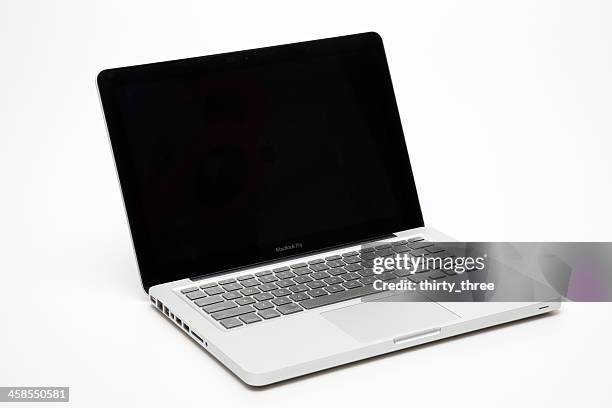 apple's macbook pro - mac laptop stock pictures, royalty-free photos & images