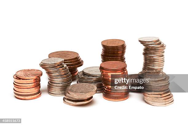 stacks of uk coins isolated on white background. - tvåpencemynt bildbanksfoton och bilder
