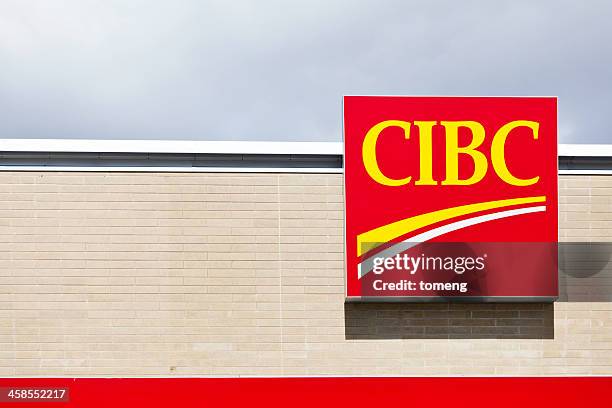 cibc sign above entrance to bank - riverbank stock pictures, royalty-free photos & images