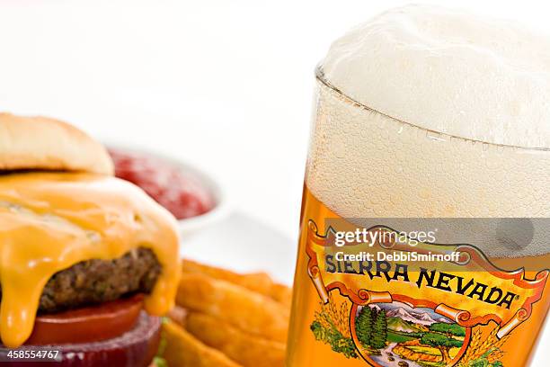 cheeseburger and a beer to wash it down - pale ale stock pictures, royalty-free photos & images