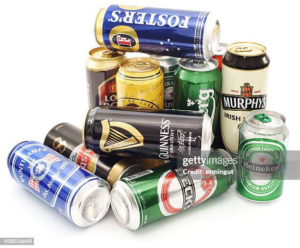 cans of beer pile isolated on white - canned food stock pictures, royalty-free photos & images