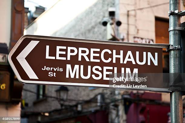 direction sign to the leprechaun museum in dublin - leprechaun stock pictures, royalty-free photos & images