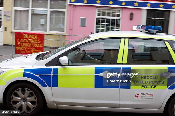 dyfed powys police car speeding past - dyfed powys stock pictures, royalty-free photos & images