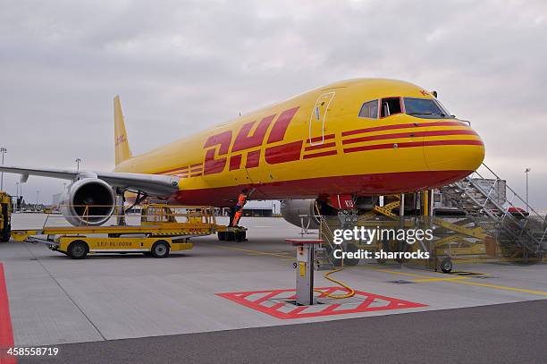 dhl boeing 757-200sf cargo aircraft - cargo planes at leipzig airport stock pictures, royalty-free photos & images