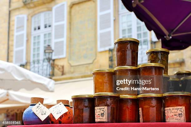 typical french marmalade and honey on sale at a market - sarlat stock pictures, royalty-free photos & images