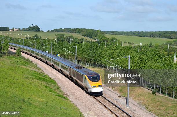 eurostar train approaching the channel tunnel - channel tunnel stock pictures, royalty-free photos & images