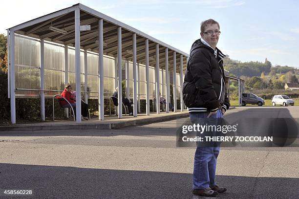 Man stands in the car park of the ESAT project, an initiative to facilitate the integration into the mainstream labour market for people with...