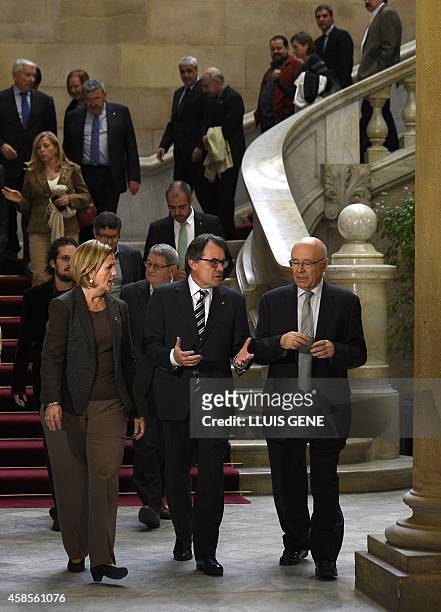 President of Catalonia's regional government Artur Mas and Catalan Parliament's president Nuria de Gispert arrive for a meeting of the "Pacte...