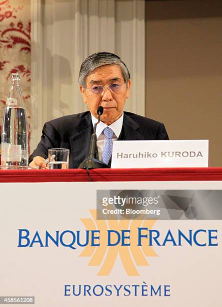 Haruhiko Kuroda, governor of the Bank of Japan , pauses at the International Symposium of the Bank of France policy conference in Paris, France, on...