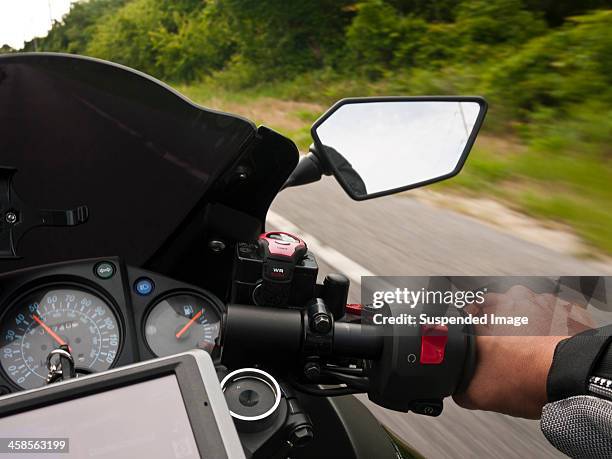 gps on a motorcycle - garmin-global-positioning-system stock pictures, royalty-free photos & images