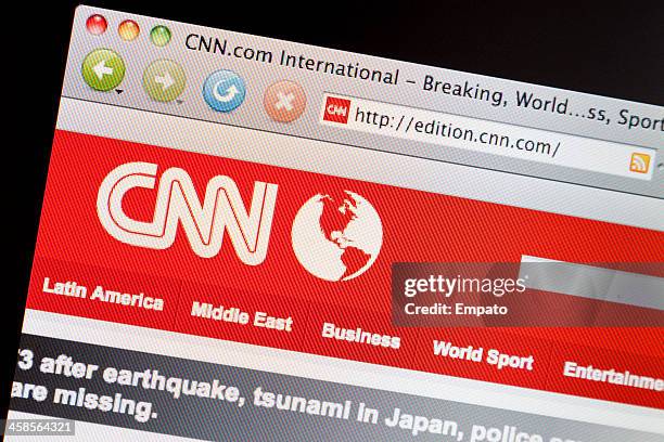 cnn.com website viewed on computer screen. - cnn news stock pictures, royalty-free photos & images