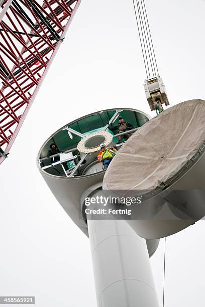 enercon e82 wind turbine under construction. - enercon stock pictures, royalty-free photos & images