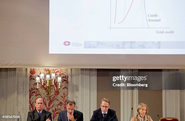 Left to right, Laurence "Larry" Fink, chief executive officer of BlackRock Inc., Mark Carney, governor of the Bank of England, Jens Weidmann,...