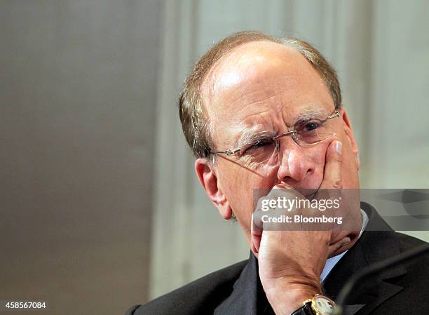 Laurence "Larry" Fink, chief executive officer of BlackRock Inc., reacts at the International Symposium of the Bank of France policy conference in...