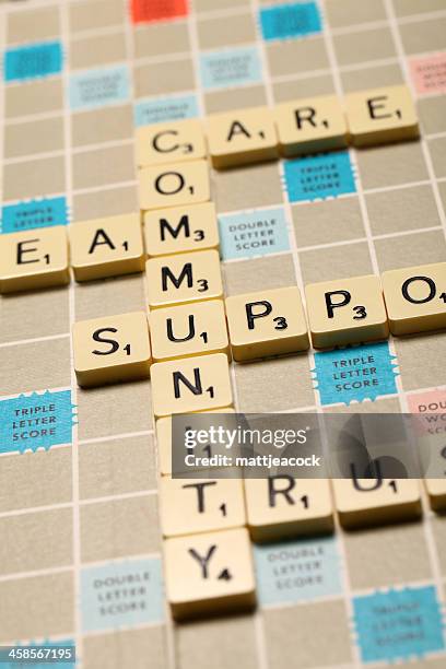 community-scrabble worte - scrabble letters stock-fotos und bilder