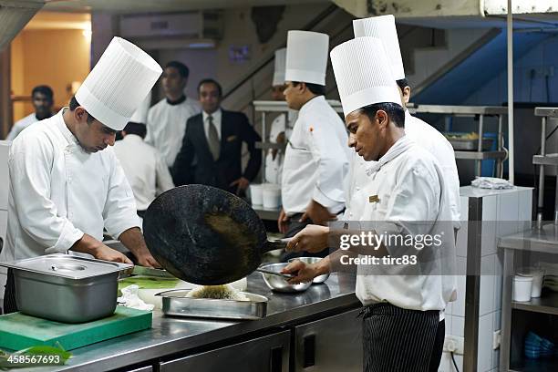 indian hotel chefs preparing food - indian chef stock pictures, royalty-free photos & images