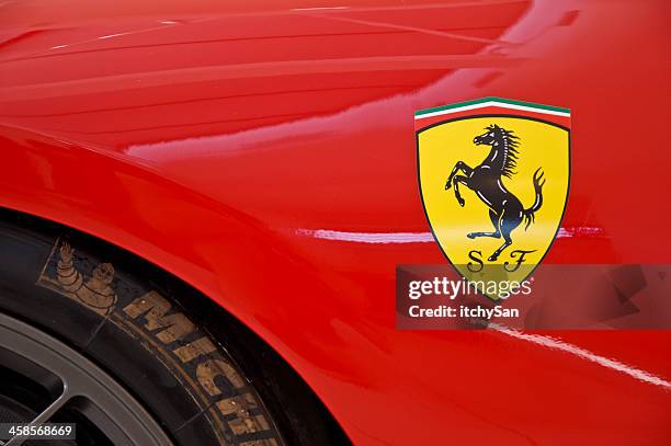 ferrari con logo - ferrari foto e immagini stock