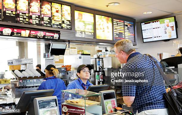 mcdonald's fast food - mcdonalds restaurant stock pictures, royalty-free photos & images