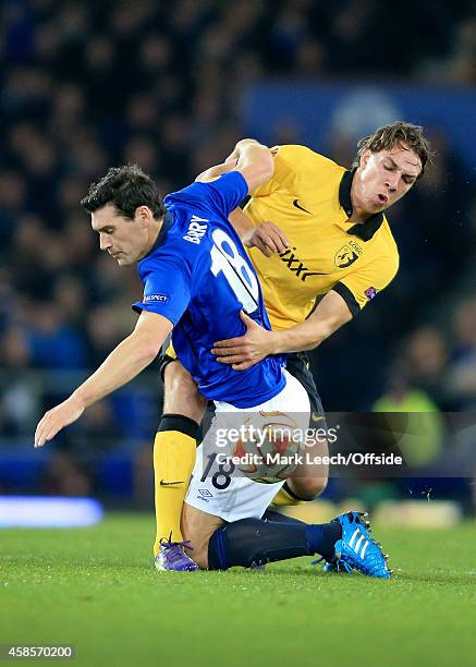 Gareth Barry of Everton battles with Michael Frey of Lille during the UEFA Europa League Group H match between Everton and LOSC Lille at Goodison...