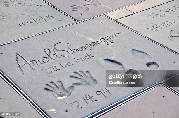 arnold schwarzenegger's hand print - hollywood boulevard stock pictures, royalty-free photos & images