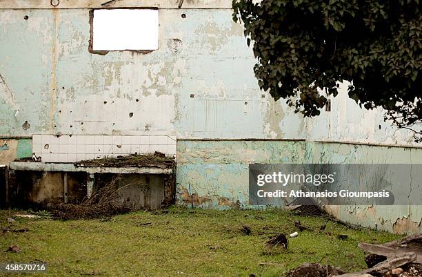 Abandoned village Haravgi on January 21, 2011 in Ptolemaida, Greece. Haravgi village was led to forced relocation because they were found at the...