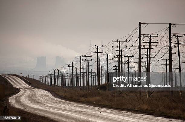 Power station near abandoned village Haravgi on January 21, 2011 in Ptolemaida, Greece. Haravgi village was led to forced relocation because they...