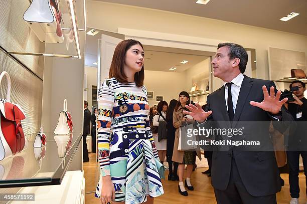 Model Hikari Mori and Delvaux CEO Marco attend the Delvaux Red Moon Party at Delvaux Omotesando on November 7, 2014 in Tokyo, Japan.