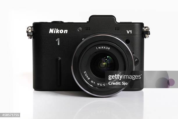 nikon v1 - nikon stock pictures, royalty-free photos & images