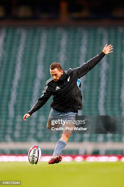 Aaron Cruden of the New Zealand All Blacks takes a kick at Twickenham Stadium on November 7, 2014 in London, England.