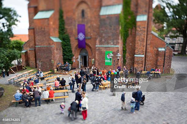 church with children / dannenberg - community festival 2011 - dorffest stock pictures, royalty-free photos & images