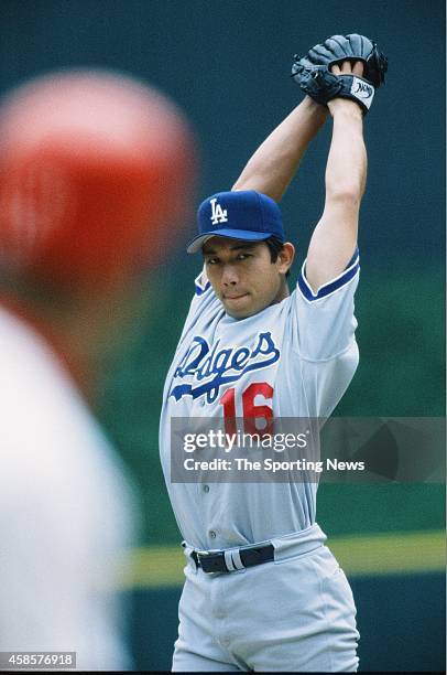 Hideo Nomo of the Los Angeles Dodgers pitches against the St. Louis Cardinals at Busch Stadium on May 12, 1996 in St Louis, Missouri.