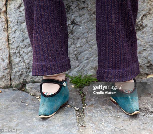 foot binding -  lotus feet - chinese foot binding stock pictures, royalty-free photos & images