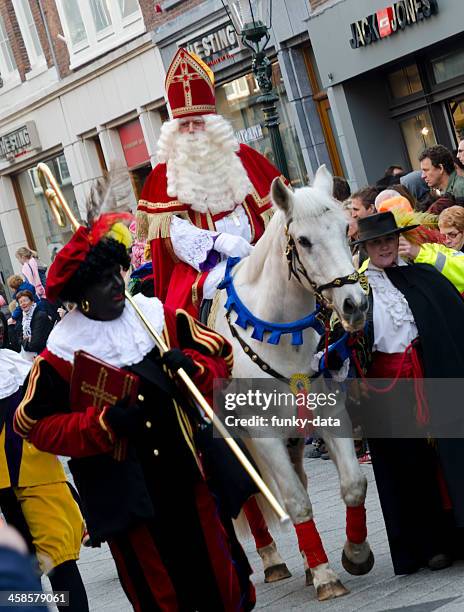 sinterklaas and zwarte piet - zwarte piet stock pictures, royalty-free photos & images