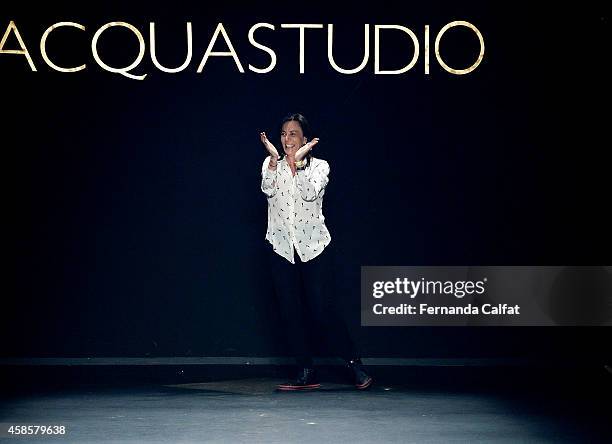 Designer Esther Bauman acknowledges the crowd on the runway at the Acquastudio fashion show during Sao Paulo Fashion Week Winter 2015 at Parque...