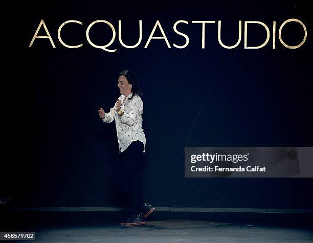 Designer Esther Bauman acknowledges the crowd on the runway at the Acquastudio fashion show during Sao Paulo Fashion Week Winter 2015 at Parque...