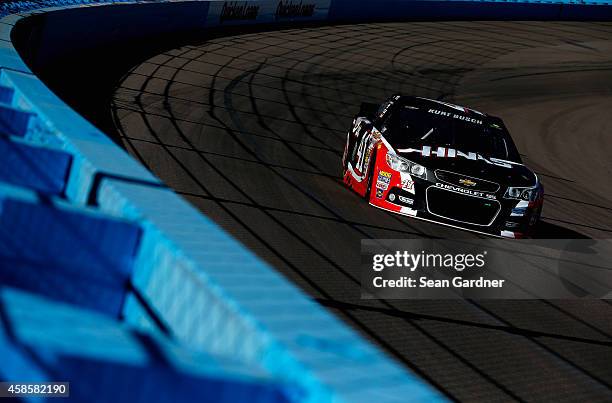 Kurt Busch, driver of the Haas Automation Chevrolet, practices for the NASCAR Sprint Cup Series Quicken Loans Race for Heroes 500 at Phoenix...