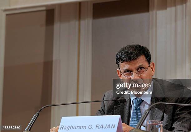 Raghuram Rajan, governor of the Reserve Bank of India , listens during the International Symposium of the Bank of France policy conference in Paris,...