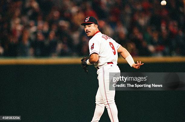 Carlos Baerga of the Cleveland Indians tosses the ball against the Texas Rangers at Progressive Field on May 17, 1996 in Cleveland, Ohio.