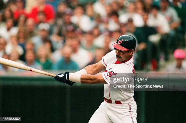 Carlos Baerga of the Cleveland Indians bats against the Texas Rangers at Progressive Field on May 17, 1996 in Cleveland, Ohio.