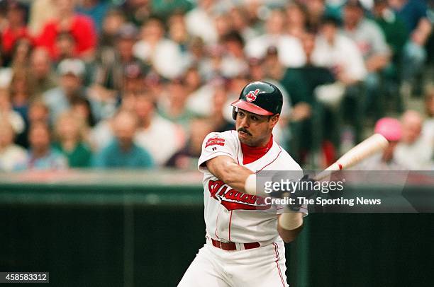 Carlos Baerga of the Cleveland Indians bats against the Texas Rangers at Progressive Field on May 17, 1996 in Cleveland, Ohio.