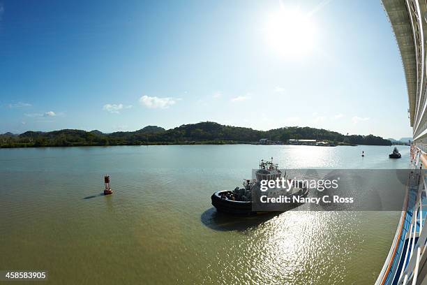 tug boat alongside cruise ship, panama canal, fisheye - panama canal and cruise stock pictures, royalty-free photos & images