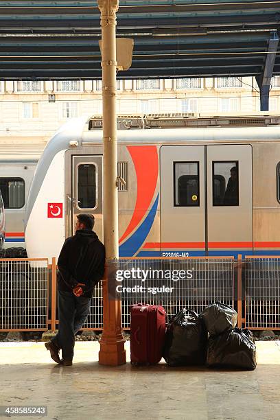 man at the station - orient express stock pictures, royalty-free photos & images