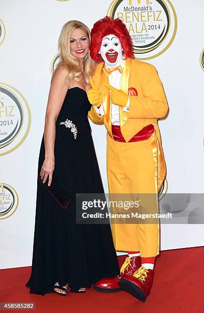 Sonya Kraus and Ronald McDonald attend the McDonald's charity gala on November 7, 2014 in Weissach near Rottach-Egern, Germany.