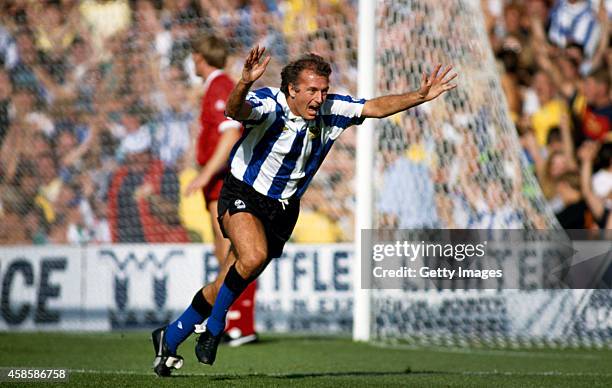 Sheffield Wednesday striker Trevor Francis celebrates after scoring the winning goal during a First Division Match between Sheffield Wednesday and...