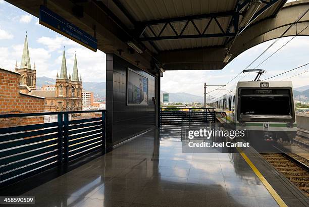 metro train at station in medellín, colombia - metro medellin stock pictures, royalty-free photos & images