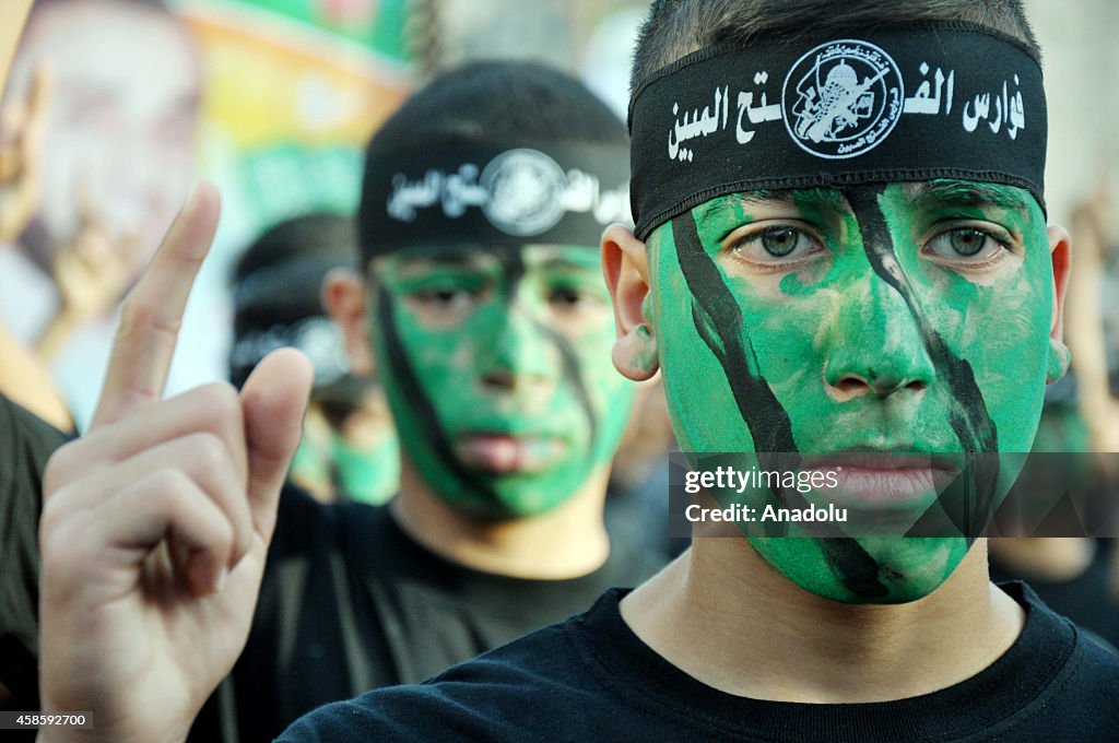 Palestinian boys graduated from military camp in Gaza