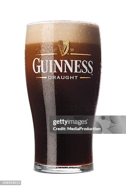 pint guinness - pint stock-fotos und bilder