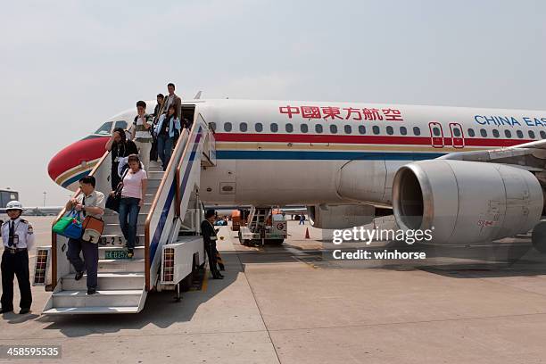 china eastern airlines : airbus a320-200 - shanghai pudong international airport stock pictures, royalty-free photos & images