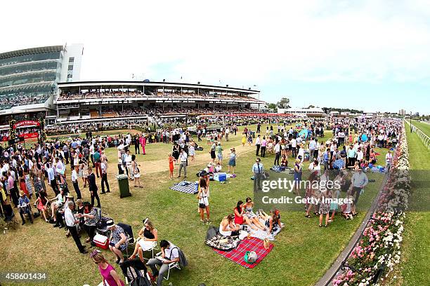 Spectators enjoy the atmosphere on Stakes Day at Flemington Racecourse on November 8, 2014 in Melbourne, Australia.